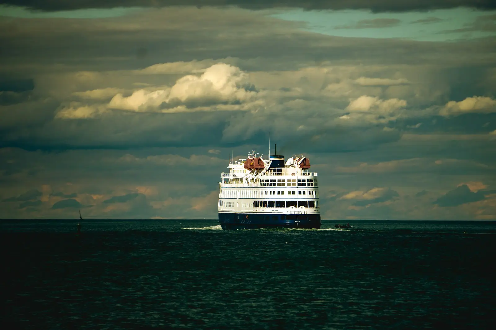 Cruise ship sailing on blue water